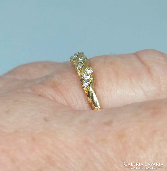 Gold-plated ring with white topaz crystals