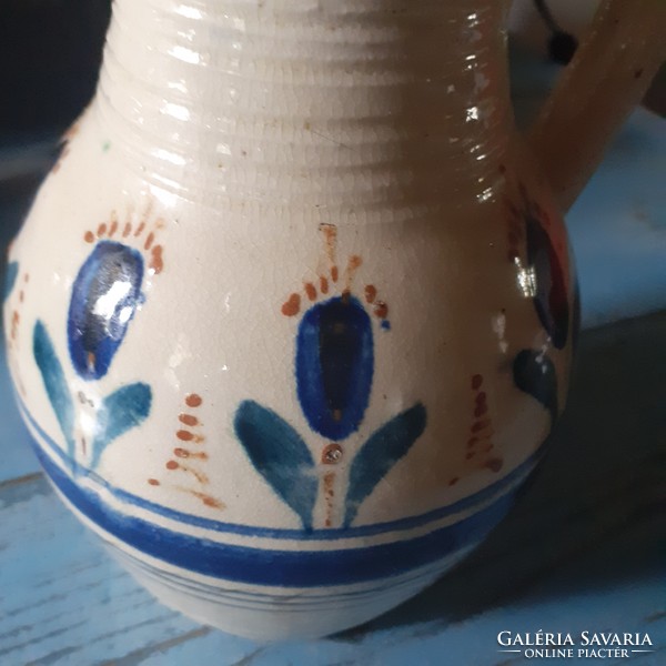 Beautiful old folk ceramics are for sale together. Rustic decoration.