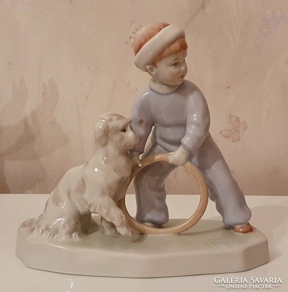 Zsolnay child with hoop and dog