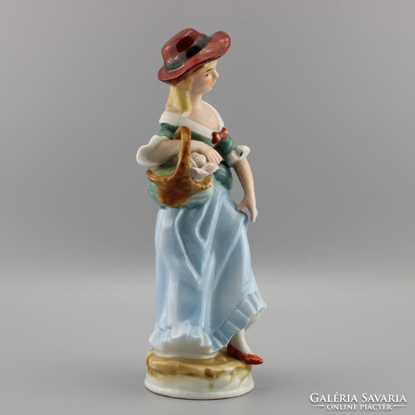 Woman porcelain sculpture, old vintage sculpture