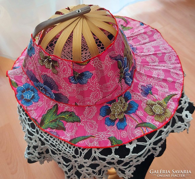 Beautiful patterned fan and hat, made of bamboo and textile