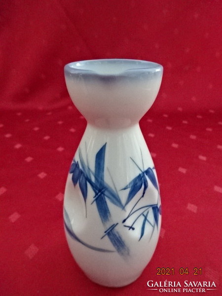 Japanese porcelain brandy pouring, height 13 cm. He has!