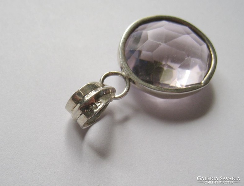 Old silver pendant with glittering pink stones