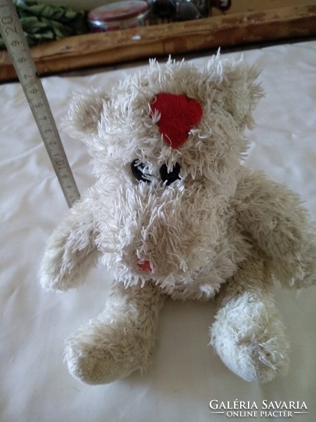 Teddy bear with heart, negotiable
