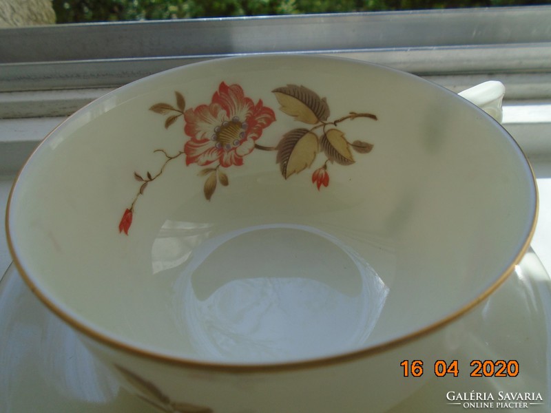 Augarten with a painting-like flower pattern on the inside as well, with a teacup coaster