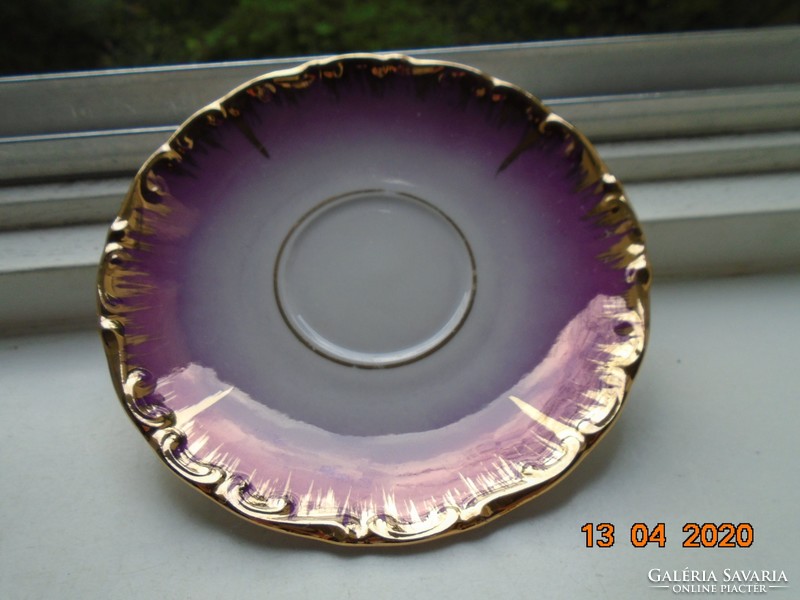 Richly hand-gilded pinkish purple plate with German and Austrian markings
