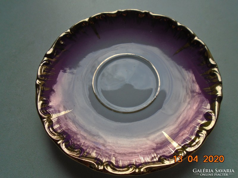 Richly hand-gilded pinkish purple plate with German and Austrian markings