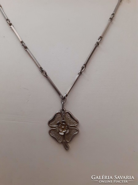 Retro silver-plated clover luck pendant on a matching chain