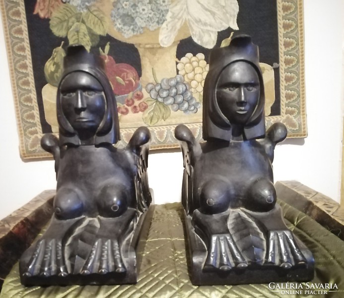 Antique carved sphinx couple