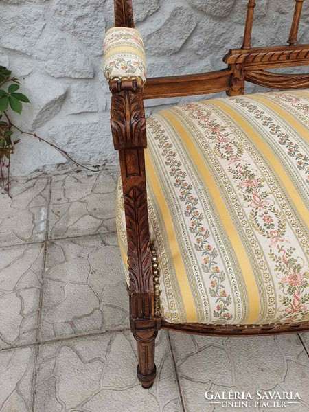 Freshly upholstered antique classicist french sofa