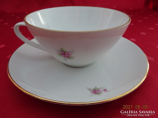 Czechoslovak porcelain teacup + placemat with gold trim. He has!