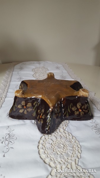 Old star-shaped, glazed baking dish