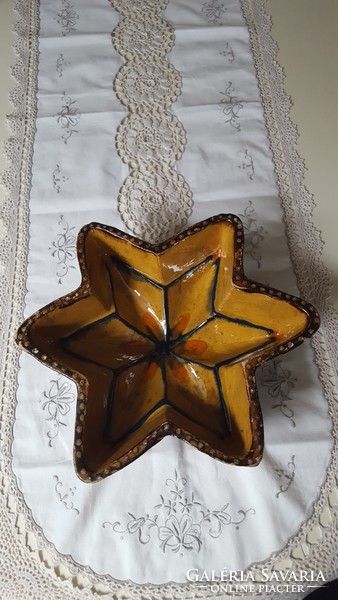 Old star-shaped, glazed baking dish