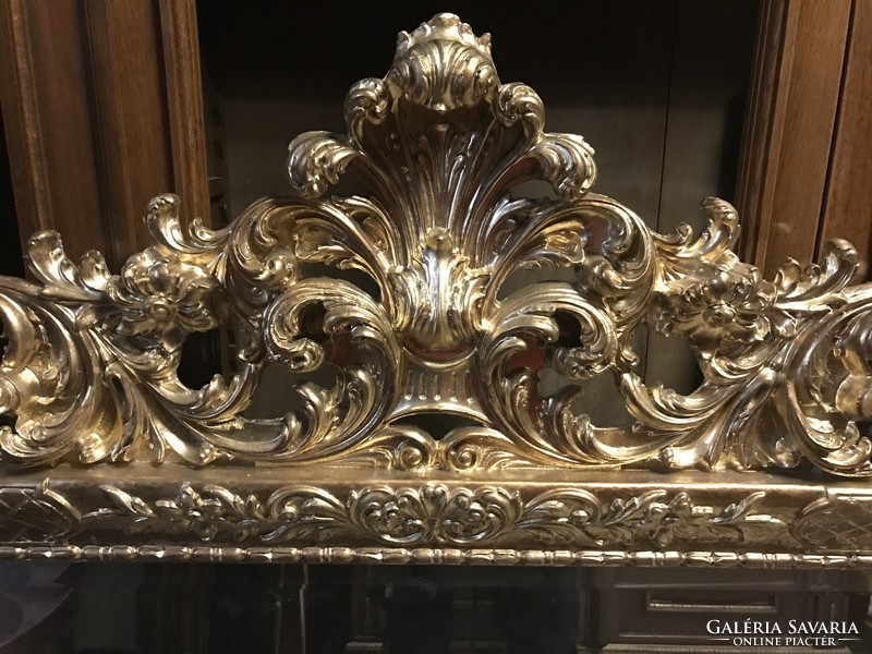 Polished mirror with golden frame