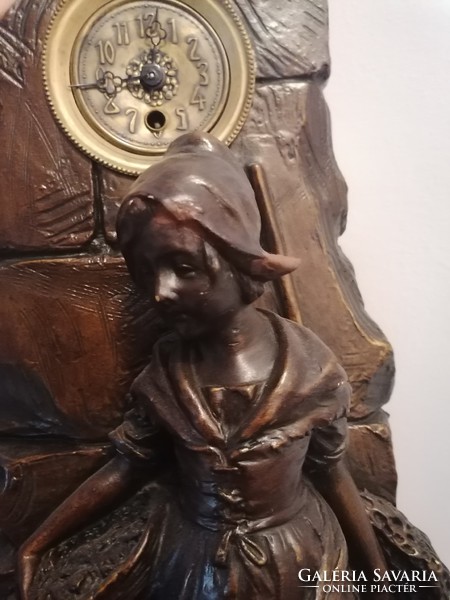 Statue with clock