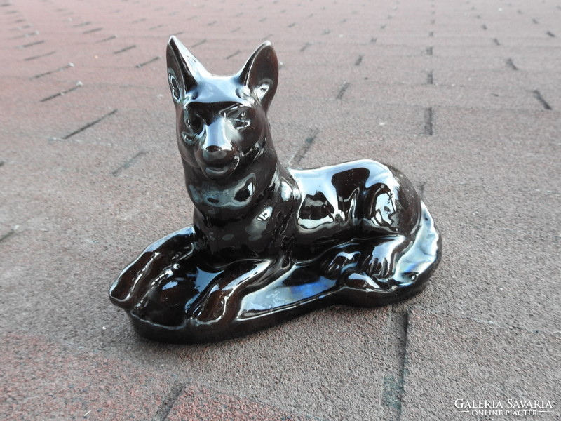 Old glazed ceramic wolf dog - dog