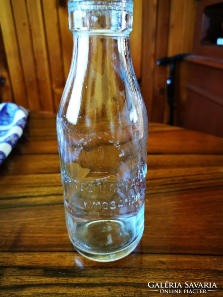 Old labeled milk bottle is flawless