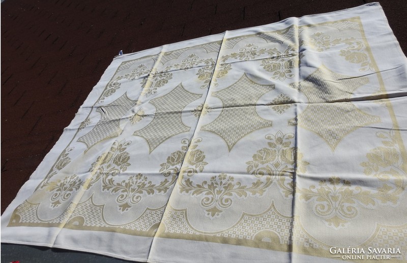 Tablecloth with golden pattern