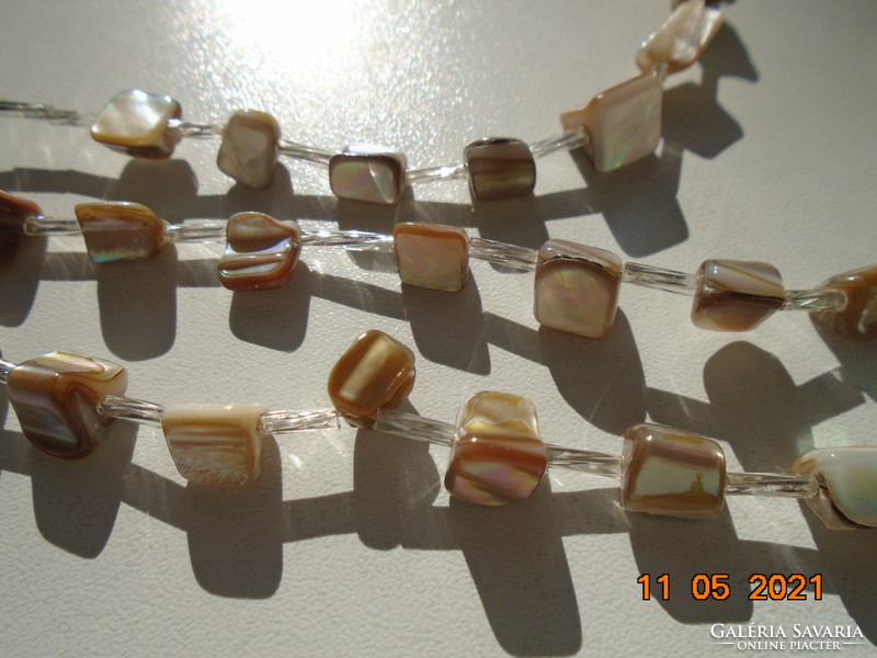 3-row necklace made of polished faceted shell pearls
