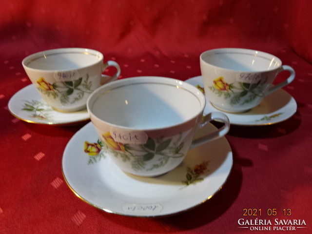 Kahla German porcelain, yellow rose patterned teacup + placemat. He has!