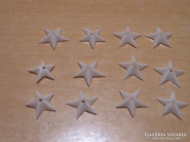 Mn 10 + 2 5-pointed bone stars # + zs