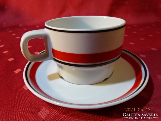 Portuguese porcelain, red striped ikea teacup + placemat. He has!