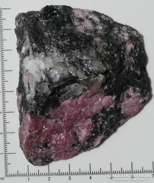 A piece of natural, partially polished rhodonite. Collection or jewelry base material. 165 Grams.