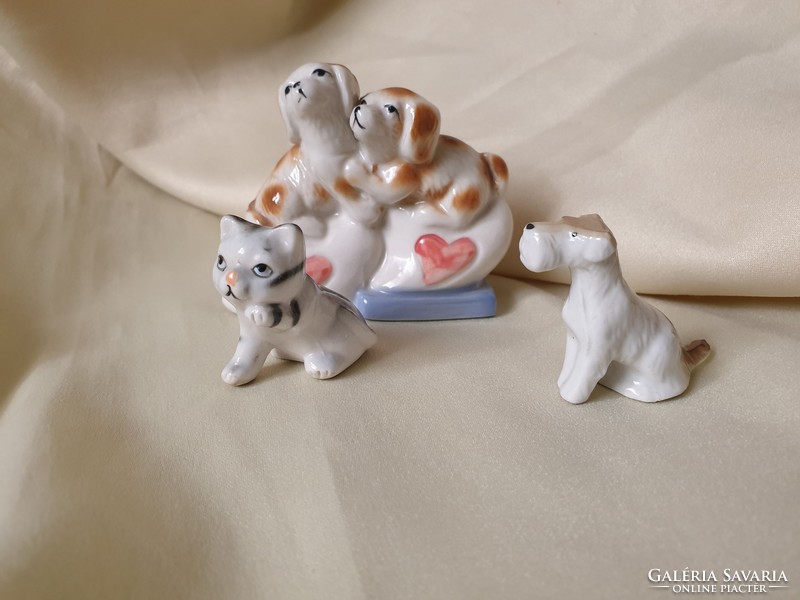 Porcelain cat and dog trio