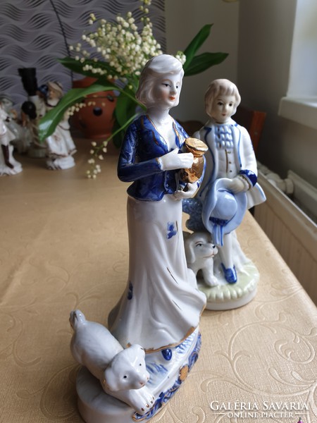 Antique porcelain figurine pair, faithful pair with dogs for sale!