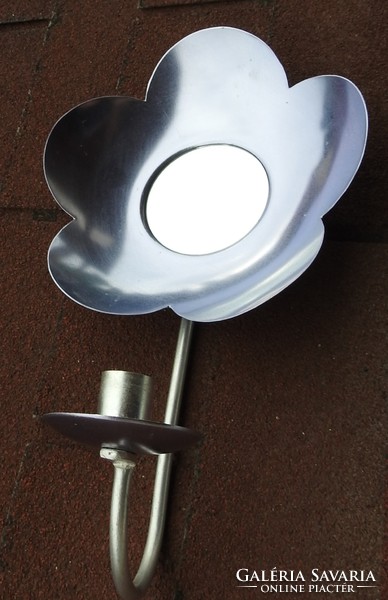 Daisy-shaped wall-mounted metal candle holder with mirror