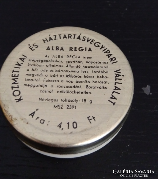 Metal box of retro alba regia sports cream, which, according to the label, is great for all skin types and occasions