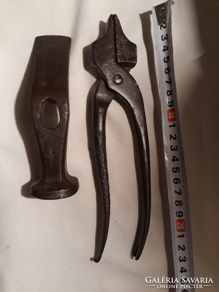 Two old shoemaker's tools (one is a trowel)