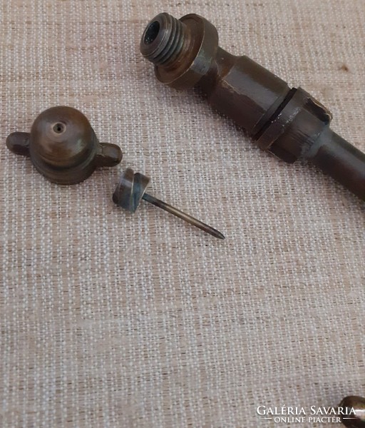 Old copper sprayer stem and copper taps in one.
