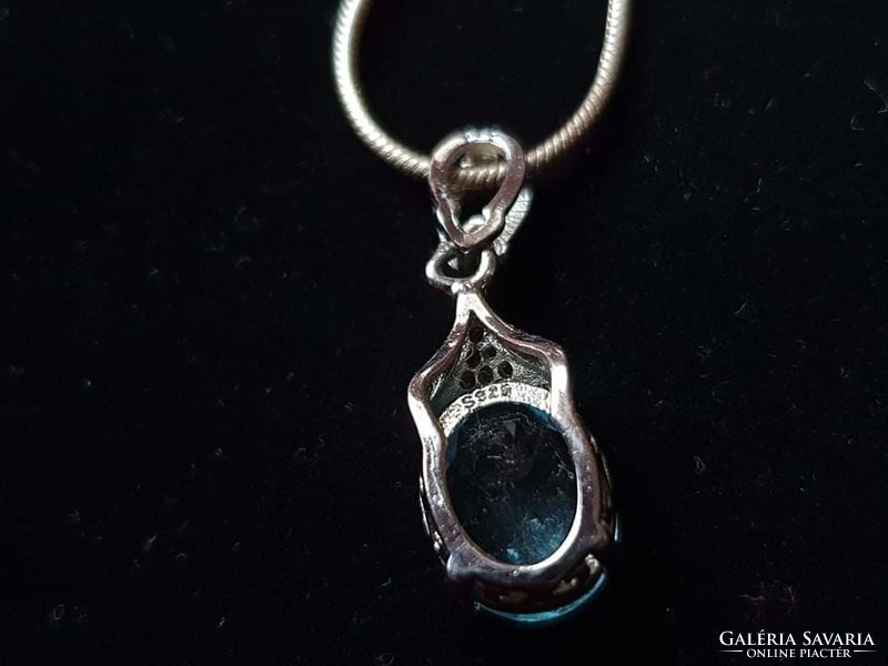Silver pendant with aquamarine stone and zirconia disc
