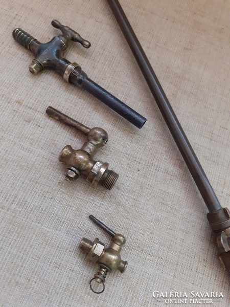 Old copper sprayer stem and copper taps in one.