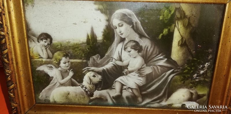 Old farmhouse decoration, holy image of the Virgin Mary with Jesus.
