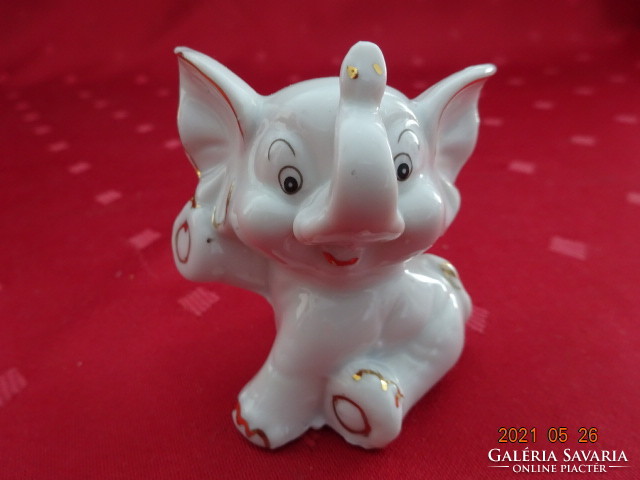 German porcelain figural statue, mini elephant, with gold decoration, height 6 cm. He has!