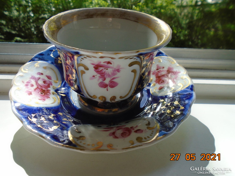 19. Tea set with cobalt gold hand painted rose patterns