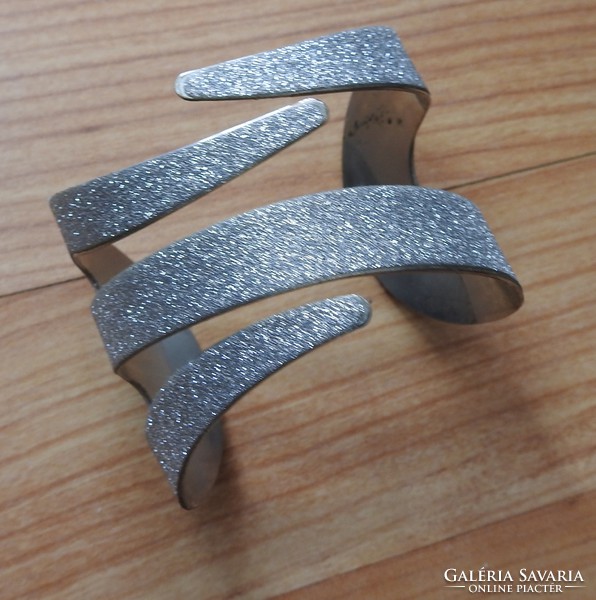 Silver colored shiny bracelet - bangle