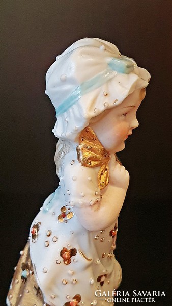 Antique porcelain girl figurine with headscarf, headband.