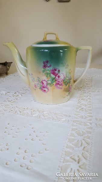 Antique porcelain jug with roses, for decoration