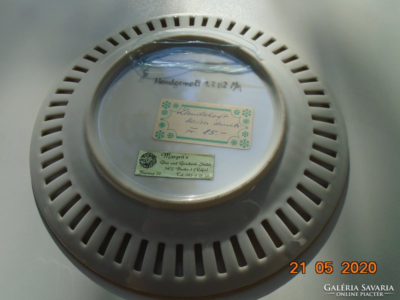 Hand-painted openwork wall plate with sign with German distributor's label
