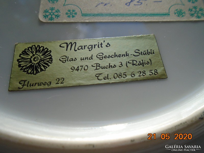 Hand-painted openwork wall plate with sign with German distributor's label