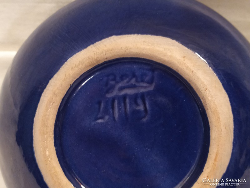 Marked ceramic ashtray