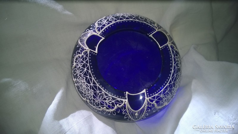 Showy cobalt blue with a hand-painted ashtray lace pattern.