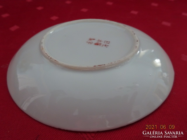 Japanese porcelain coffee cup coaster, diameter 11.5 cm. He has!