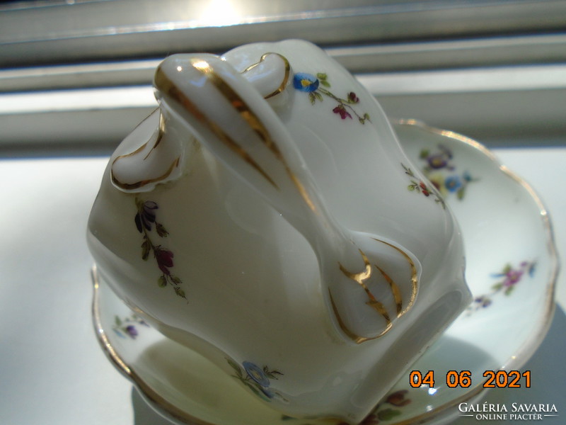 Antique with the form and pattern of Meissen porcelain, coffee cup and saucer marked 