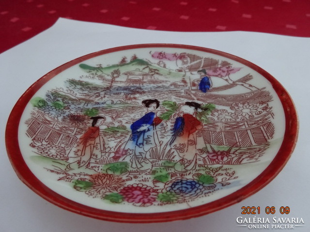 Japanese porcelain coffee cup coaster, diameter 11.5 cm. He has!