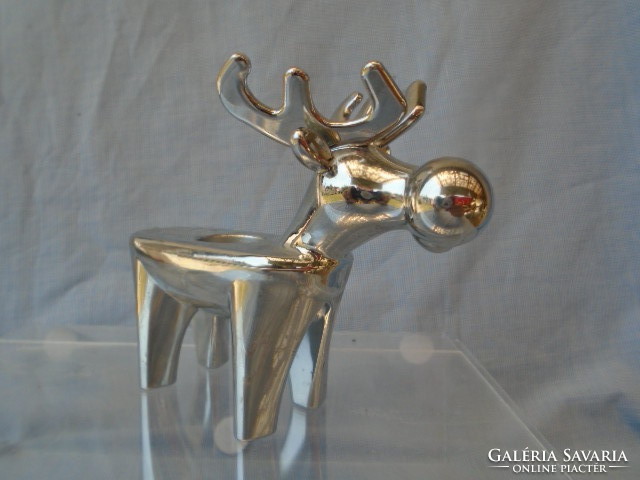 Heavy metal candlestick depicting a unique and special deer