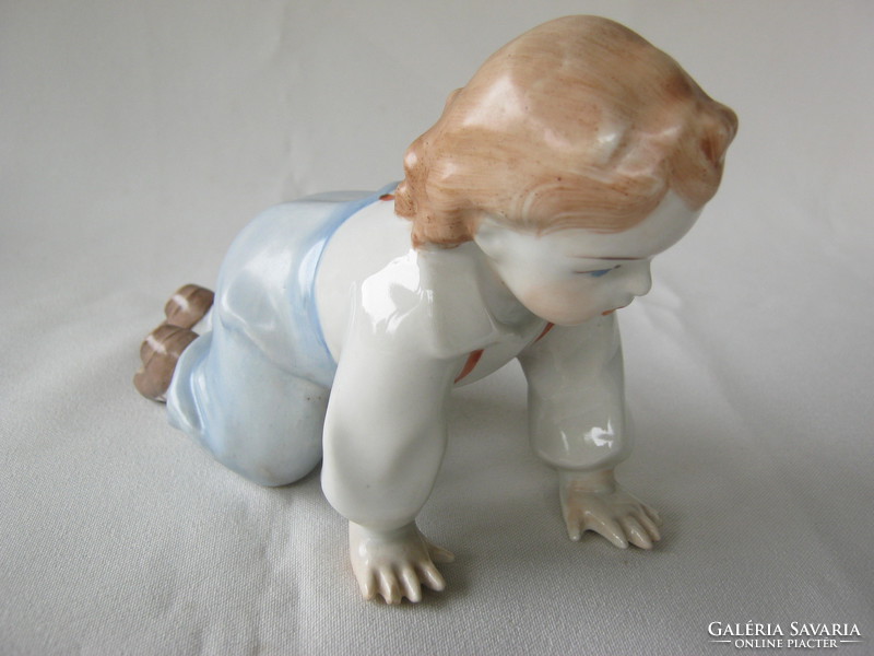 Zsolnay porcelain climbing child